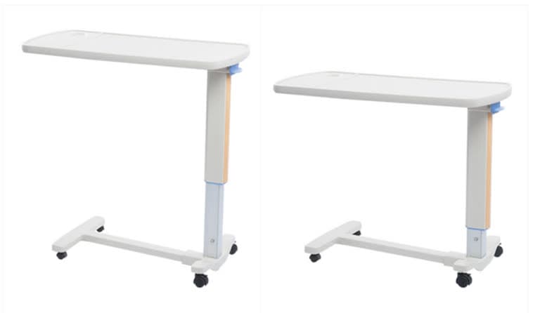 Hydraulic Over-Bed Table, two height-adjustable units with ABS tops, studio view