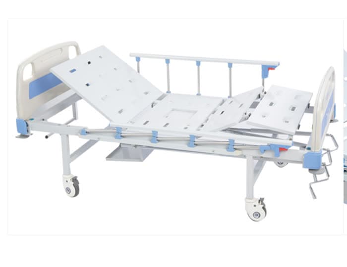 2-Function Manual Bed with Integrated Toilet, backrest and knee sections raised, rails up, studio view
