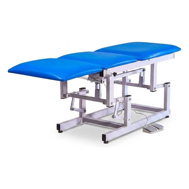 Three-Section Electric Examination Couch, blue upholstery, sections level, foot switch on floor, three-quarter studio view