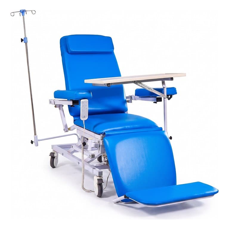 Four-Function Hemodialysis Chair, reclined with legrest raised, tray table across arms, IV pole, handset, studio view