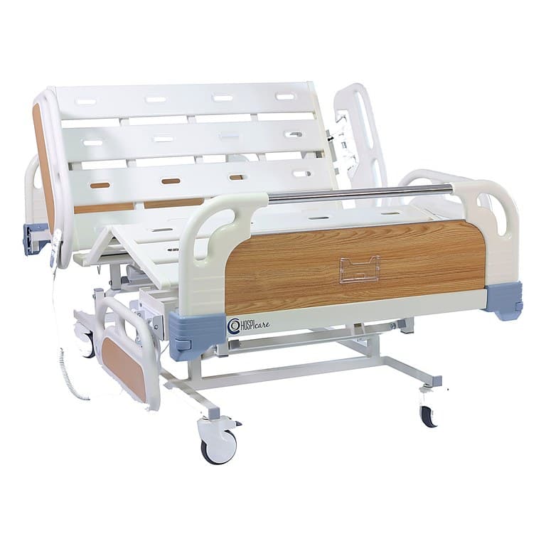 Three-Function Bariatric PRIME care Bed, backrest and knee rest raised, wood-grain panels, three-quarter studio view