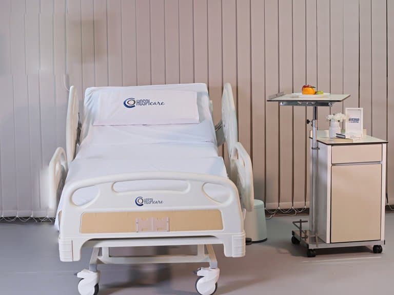 Multi-Functional PRIME care Bed, foot-end view in a patient room — MLP-01
