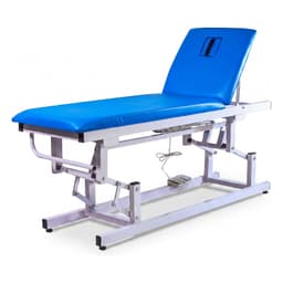 Electric Examination Couch, blue two-section top, backrest raised with face hole, foot switch, side studio view