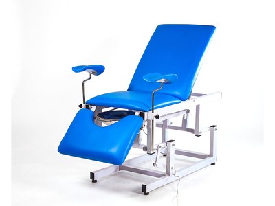 Electric Gynecology Examination Couch, backrest raised, leg supports and basin fitted, foot switch, three-quarter view