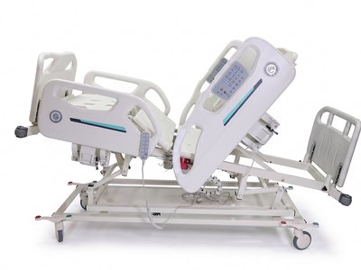 Santron Pro ICU Bed, backrest raised, side studio view with hanging handset control