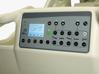 Santron Pro ICU Bed, close-up of rail control panel with weighing display and position controls