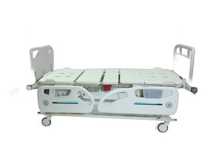 Santron Hospital Bed, side view flat with rails raised and rail control panel, white studio