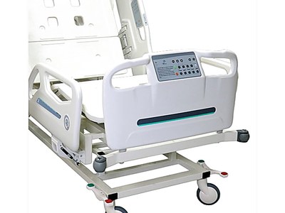 Santron Hospital Bed, three-quarter foot-end view, backrest raised, rails up, white background